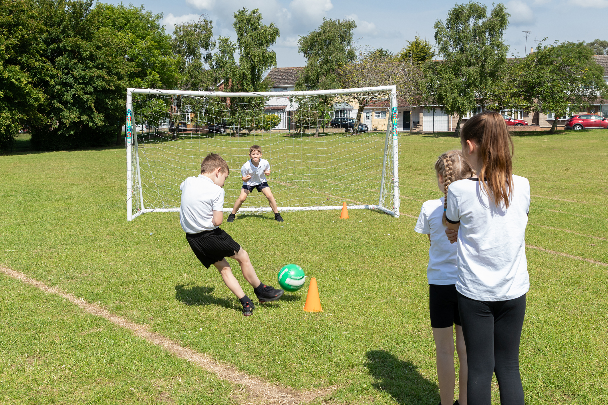 children playing football